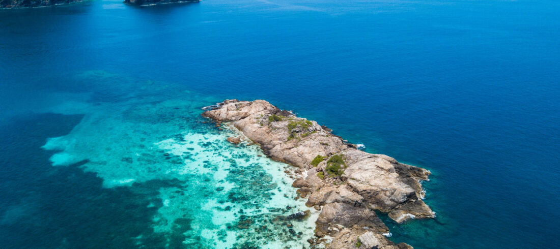 Crystal clear turquoise waters and scenic beaches of Perhentian Islands, Malaysia, the home of YBD Dive Centre.