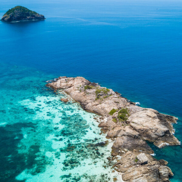 Crystal clear turquoise waters and scenic beaches of Perhentian Islands, Malaysia, the home of YBD Dive Centre.