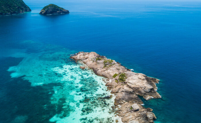Crystal clear turquoise waters and scenic beaches of Perhentian Islands, Malaysia, the home of YBD Dive Centre.