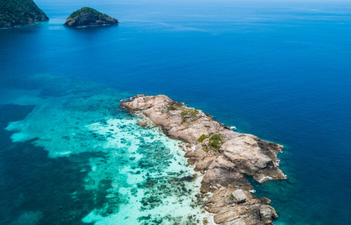 Crystal clear turquoise waters and scenic beaches of Perhentian Islands, Malaysia, the home of YBD Dive Centre.