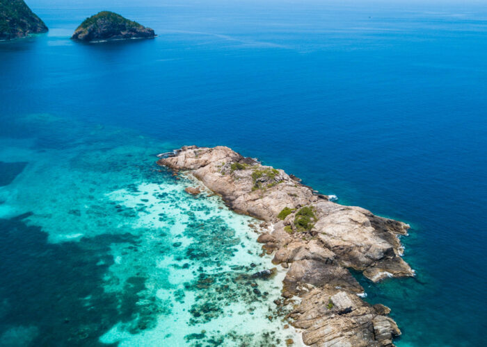 Crystal clear turquoise waters and scenic beaches of Perhentian Islands, Malaysia, the home of YBD Dive Centre.